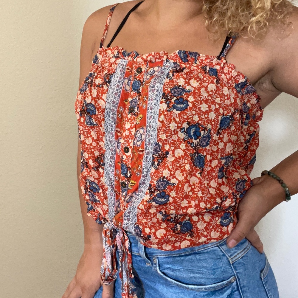 Orange floral blouse